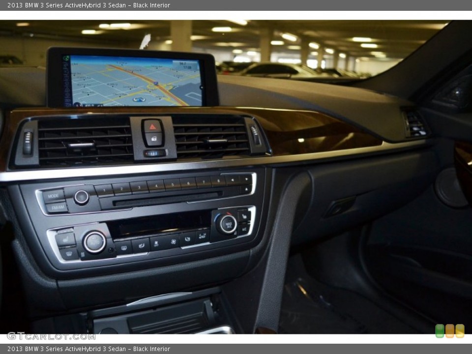 Black Interior Controls for the 2013 BMW 3 Series ActiveHybrid 3 Sedan #78655444