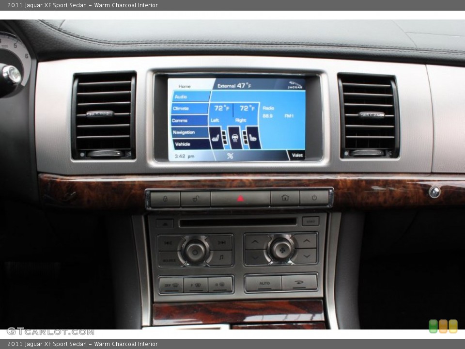 Warm Charcoal Interior Controls for the 2011 Jaguar XF Sport Sedan #78662437