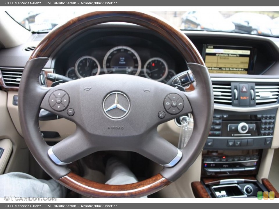 Almond/Black Interior Steering Wheel for the 2011 Mercedes-Benz E 350 4Matic Sedan #78666059
