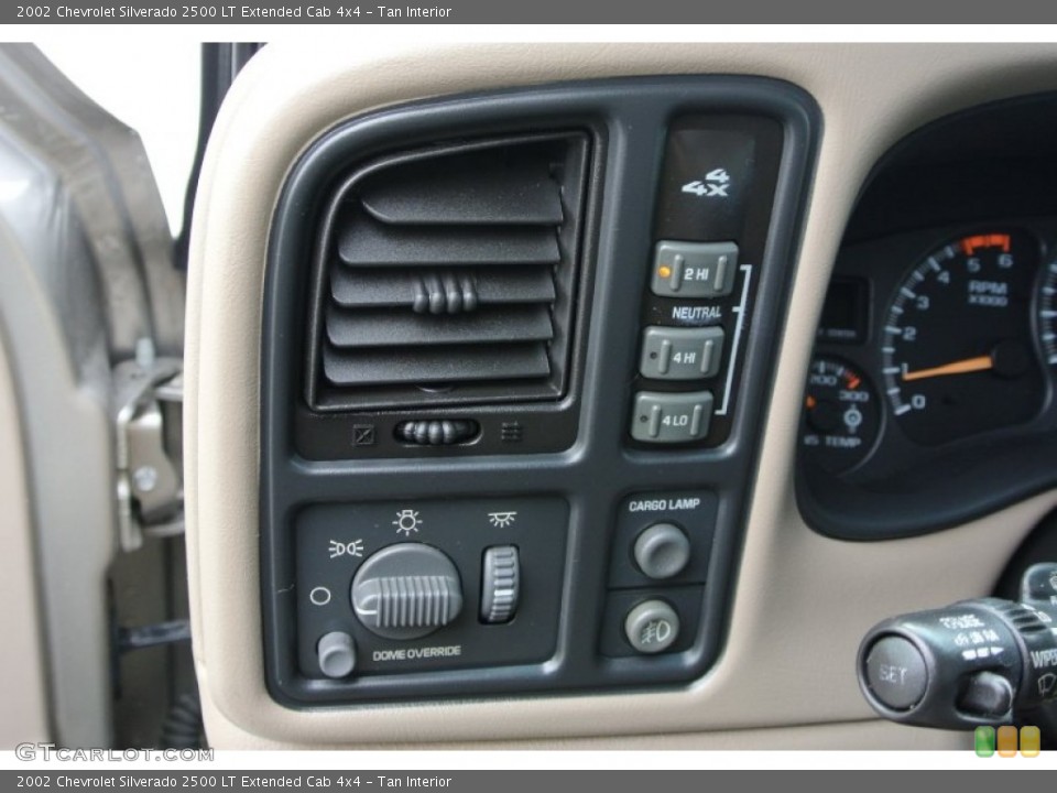 Tan Interior Controls for the 2002 Chevrolet Silverado 2500 LT Extended Cab 4x4 #78685474