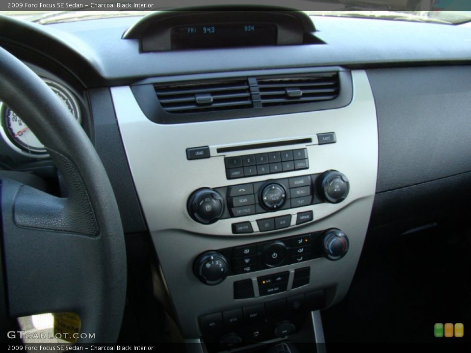 Charcoal Black Interior Controls for the 2009 Ford Focus SE Sedan #78702872
