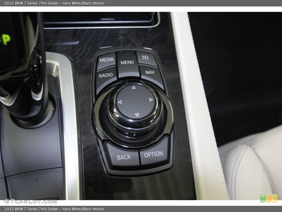 Ivory White/Black Interior Controls for the 2013 BMW 7 Series 740i Sedan #78738175