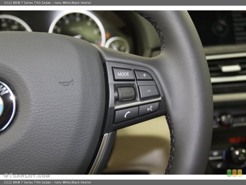 Ivory White/Black Interior Controls for the 2013 BMW 7 Series 740i Sedan #78738230