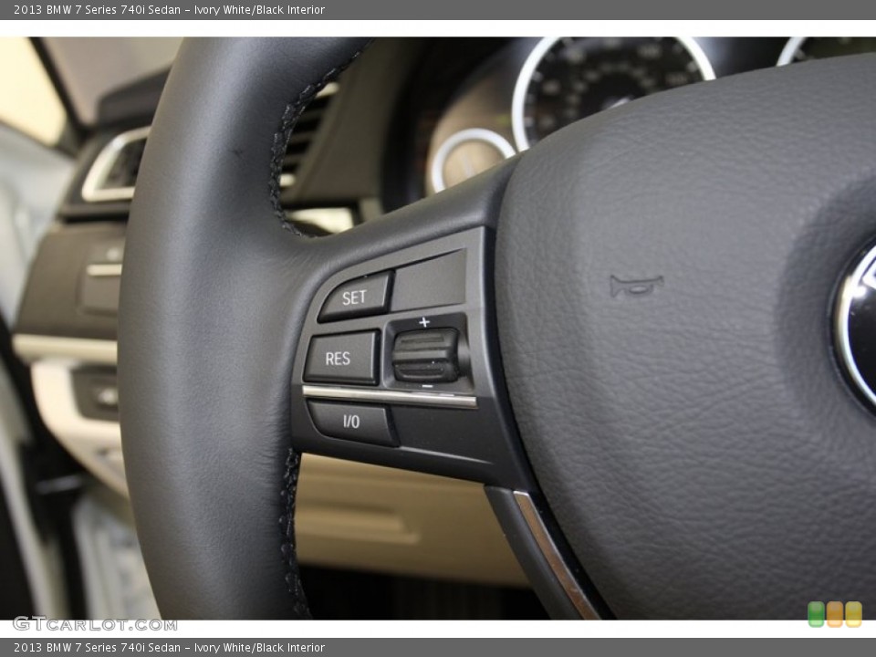 Ivory White/Black Interior Controls for the 2013 BMW 7 Series 740i Sedan #78738248