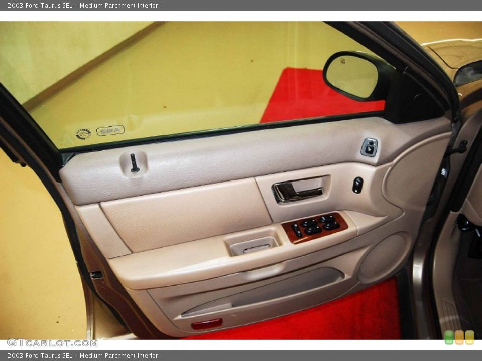 Medium Parchment Interior Door Panel for the 2003 Ford Taurus SEL #78753032