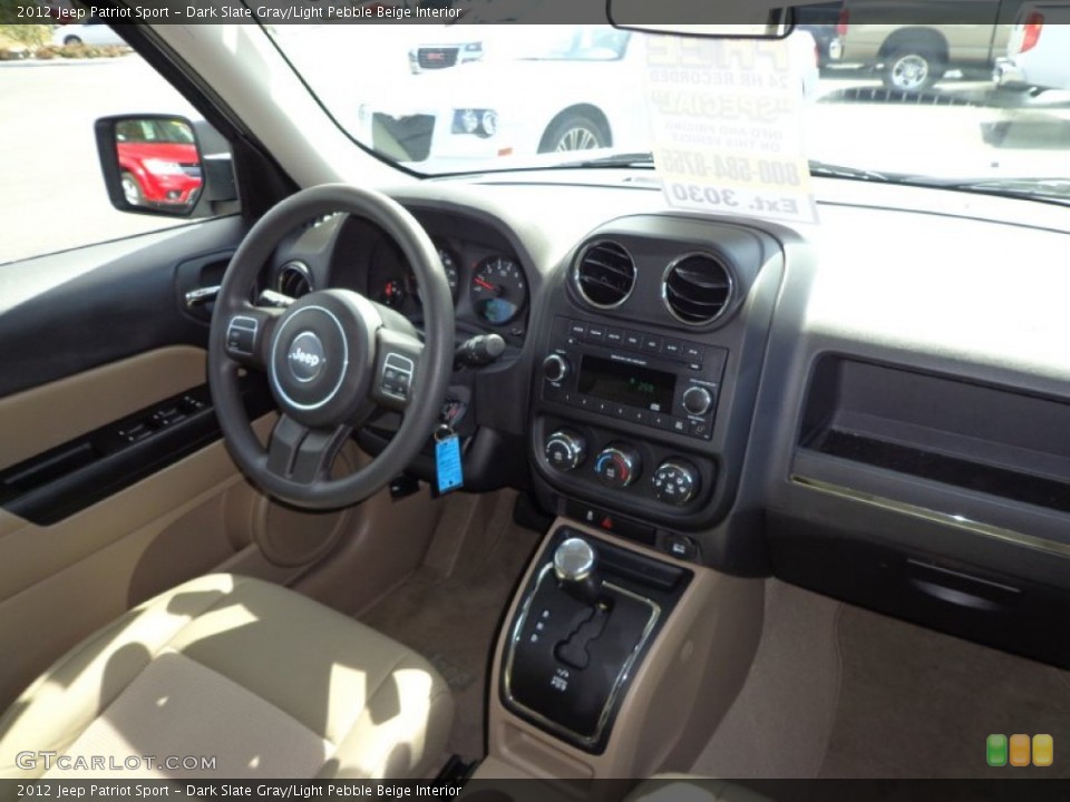 Dark Slate Gray/Light Pebble Beige Interior Dashboard for the 2012 Jeep Patriot Sport #78753642