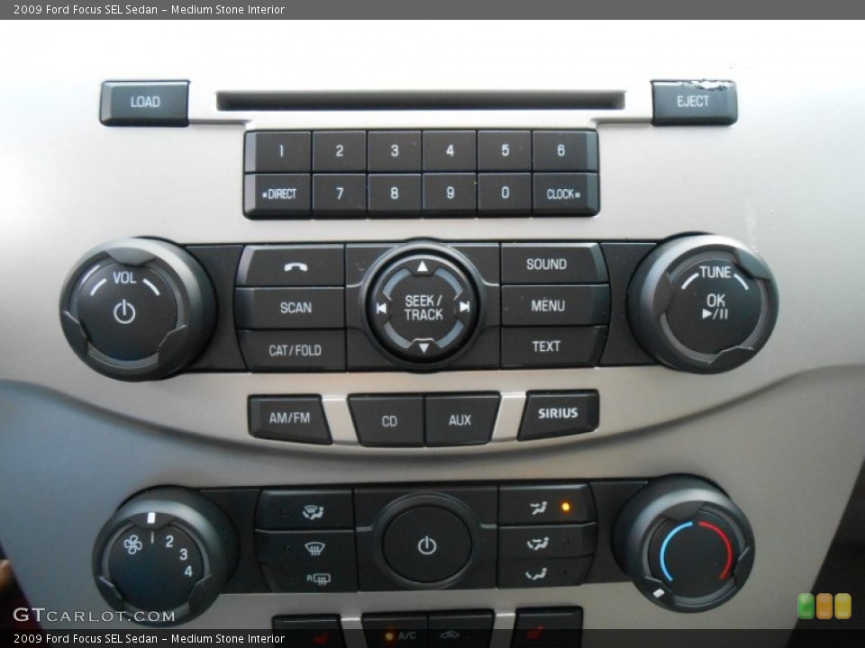 Medium Stone Interior Controls for the 2009 Ford Focus SEL Sedan #78770576