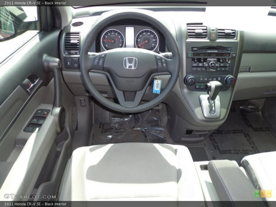 Black Interior Dashboard for the 2011 Honda CR-V SE #78774373