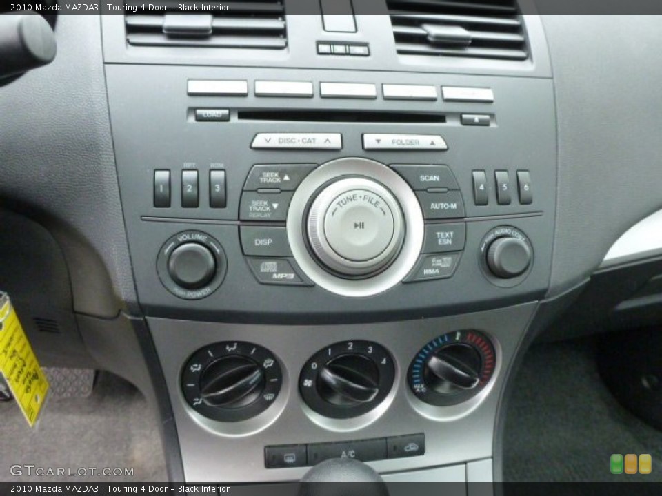 Black Interior Controls for the 2010 Mazda MAZDA3 i Touring 4 Door #78783968