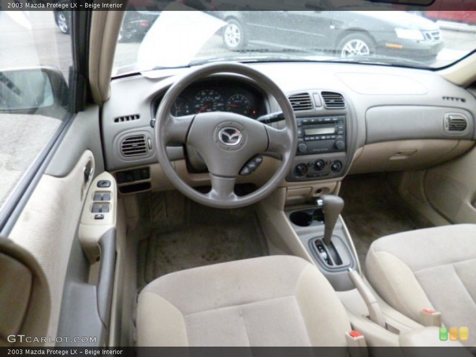 Beige Interior Dashboard for the 2003 Mazda Protege LX #78786586