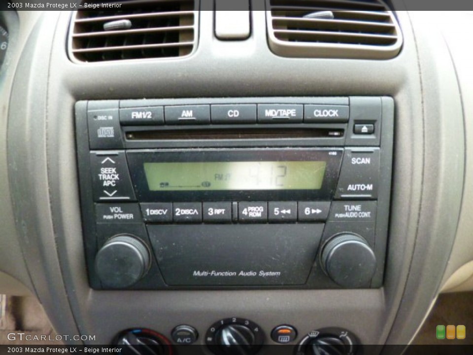 Beige Interior Audio System for the 2003 Mazda Protege LX #78786677