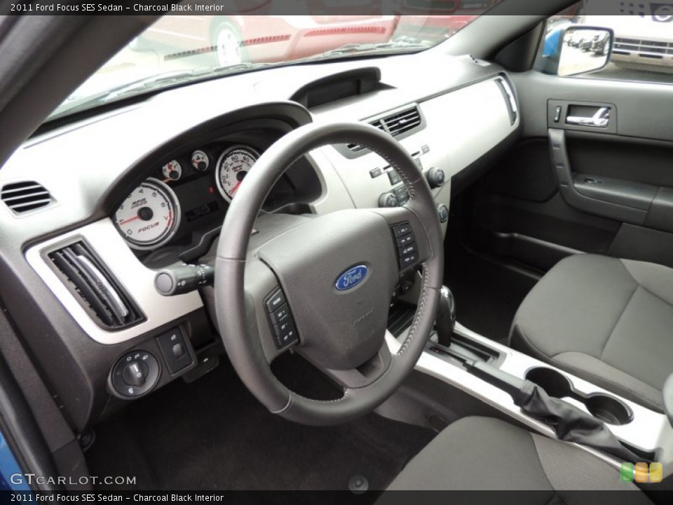 Charcoal Black Interior Dashboard for the 2011 Ford Focus SES Sedan #78798975