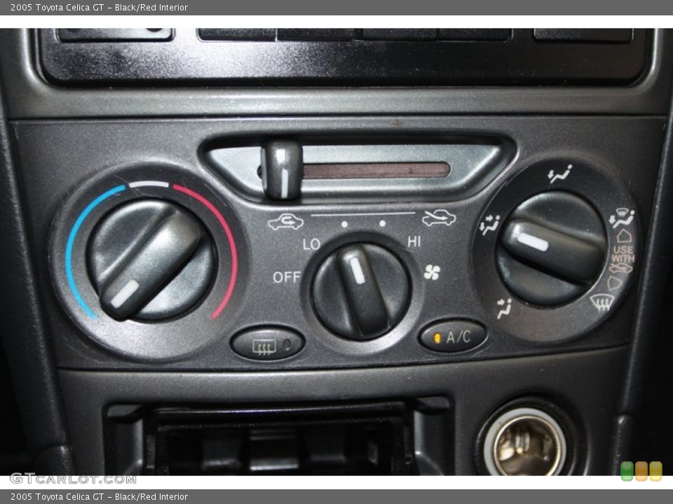 Black/Red Interior Controls for the 2005 Toyota Celica GT #78807544
