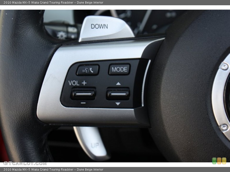 Dune Beige Interior Controls for the 2010 Mazda MX-5 Miata Grand Touring Roadster #78861481