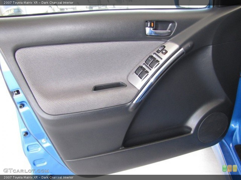 Dark Charcoal Interior Door Panel for the 2007 Toyota Matrix XR #78862387