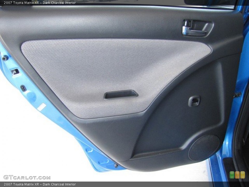 Dark Charcoal Interior Door Panel for the 2007 Toyota Matrix XR #78862402