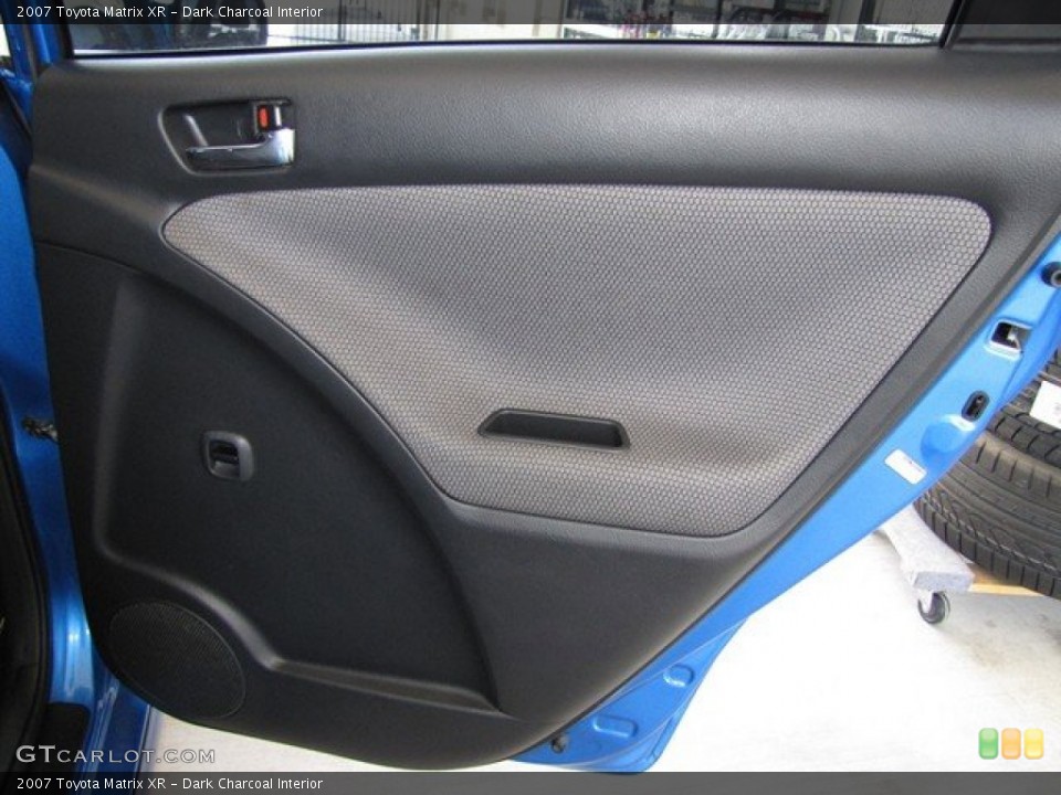 Dark Charcoal Interior Door Panel for the 2007 Toyota Matrix XR #78862417