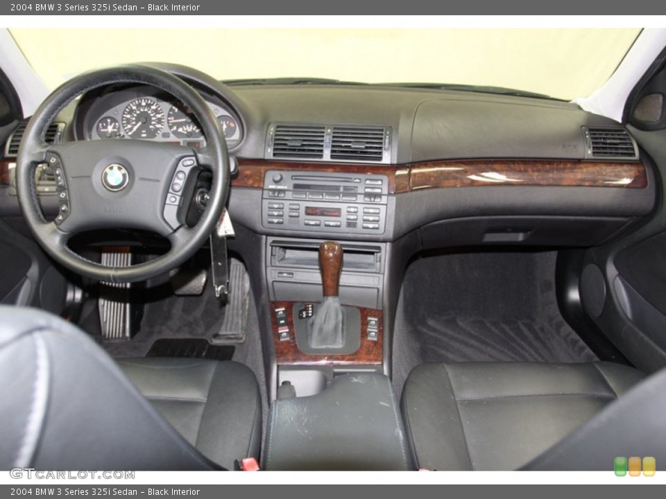 Black Interior Dashboard for the 2004 BMW 3 Series 325i Sedan #78862984