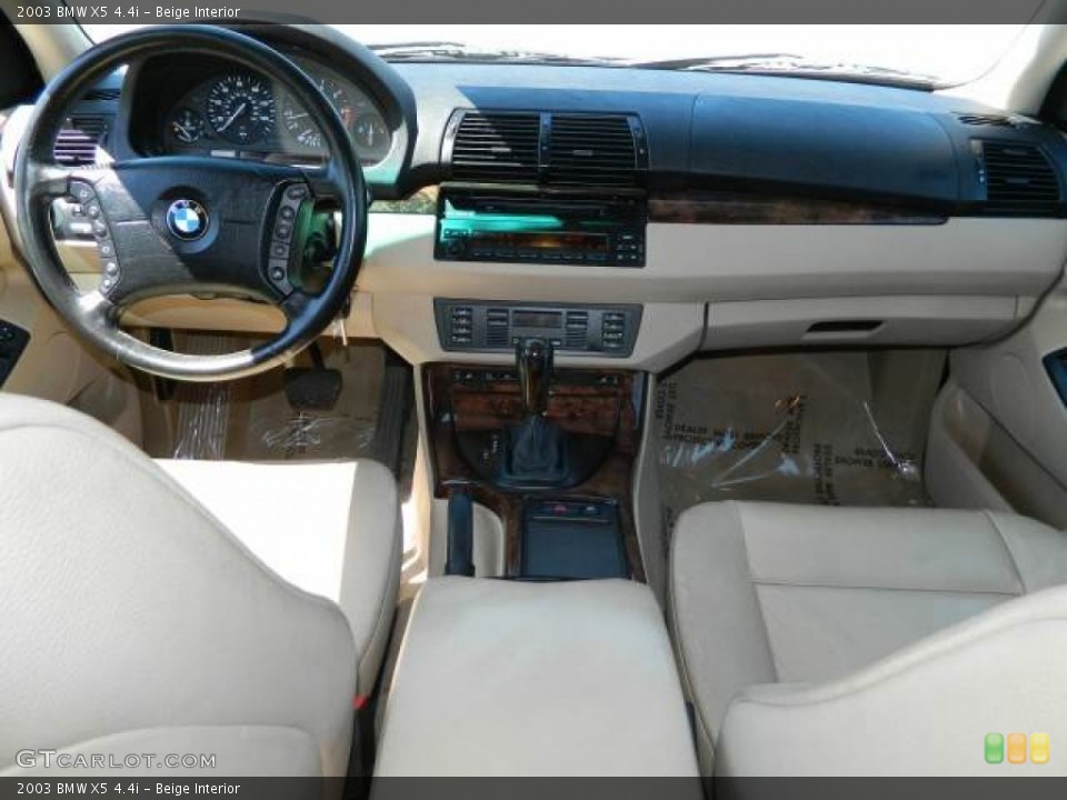 Beige Interior Dashboard for the 2003 BMW X5 4.4i #78867598