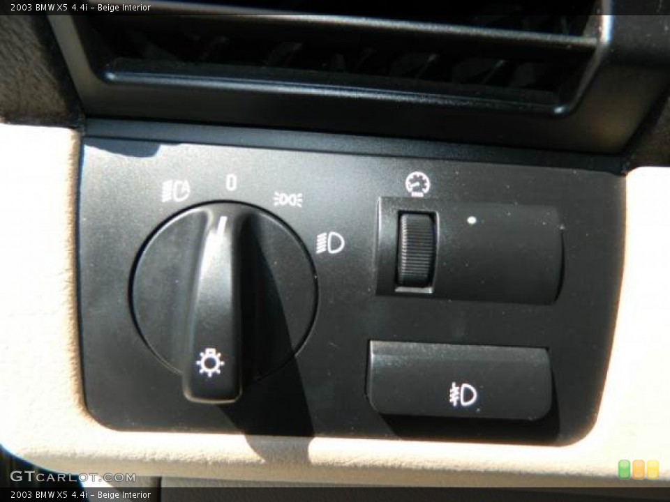 Beige Interior Controls for the 2003 BMW X5 4.4i #78867733