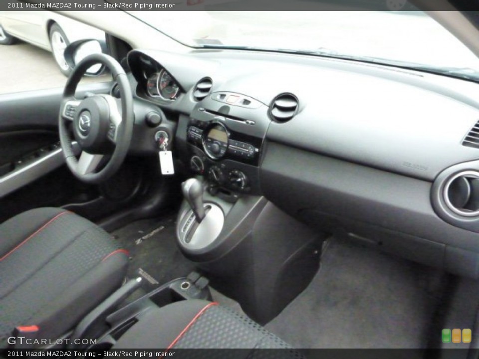 Black/Red Piping Interior Dashboard for the 2011 Mazda MAZDA2 Touring #78888057