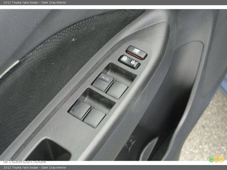 Dark Gray Interior Controls for the 2012 Toyota Yaris Sedan #78890398
