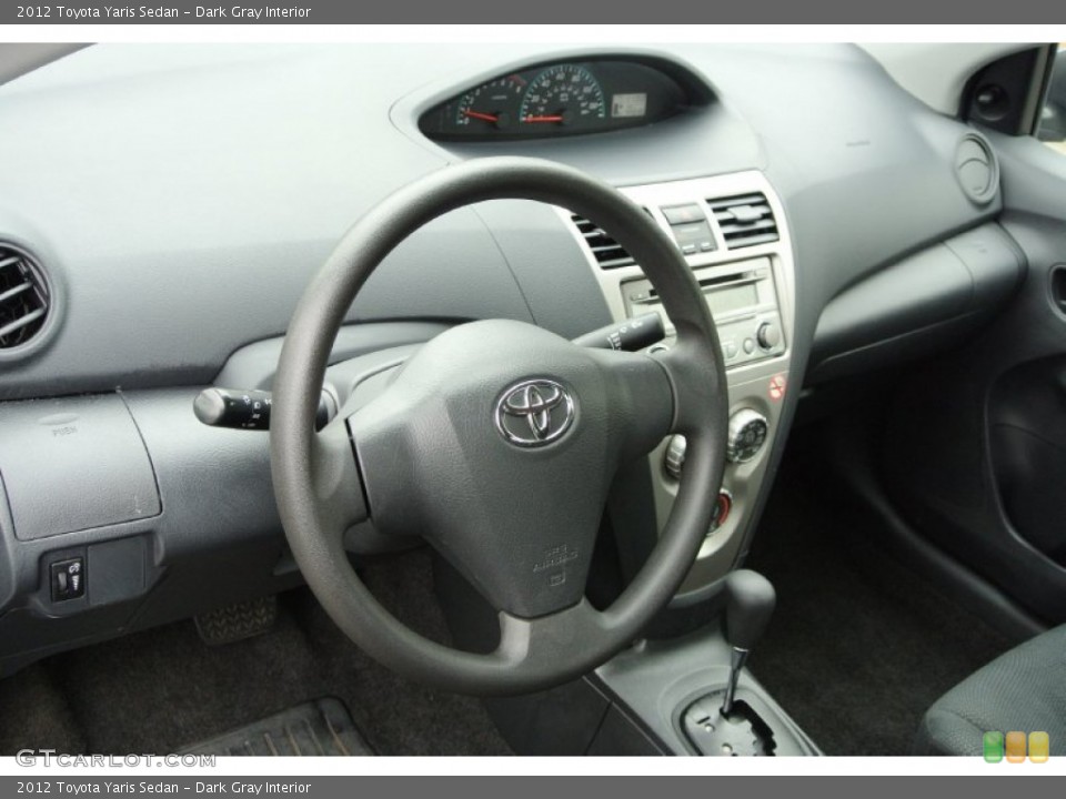 Dark Gray Interior Dashboard for the 2012 Toyota Yaris Sedan #78890744