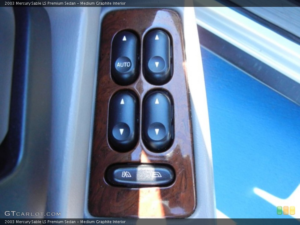 Medium Graphite Interior Controls for the 2003 Mercury Sable LS Premium Sedan #78892507