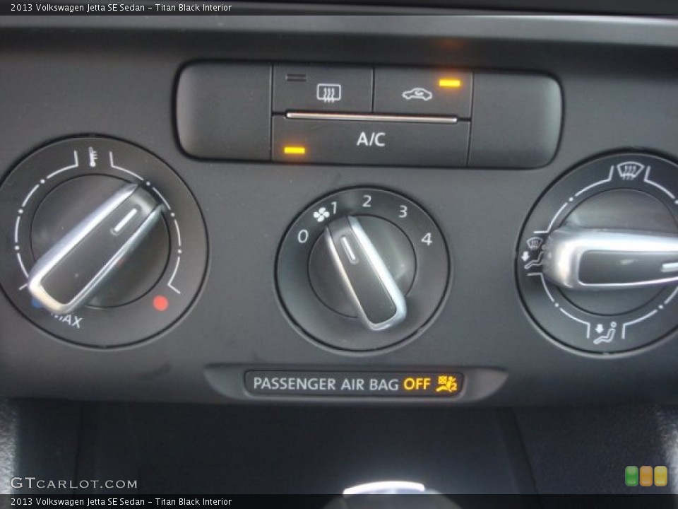 Titan Black Interior Controls for the 2013 Volkswagen Jetta SE Sedan #78906284