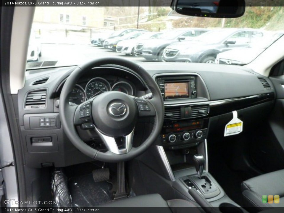 Black Interior Dashboard for the 2014 Mazda CX-5 Grand Touring AWD #78910272