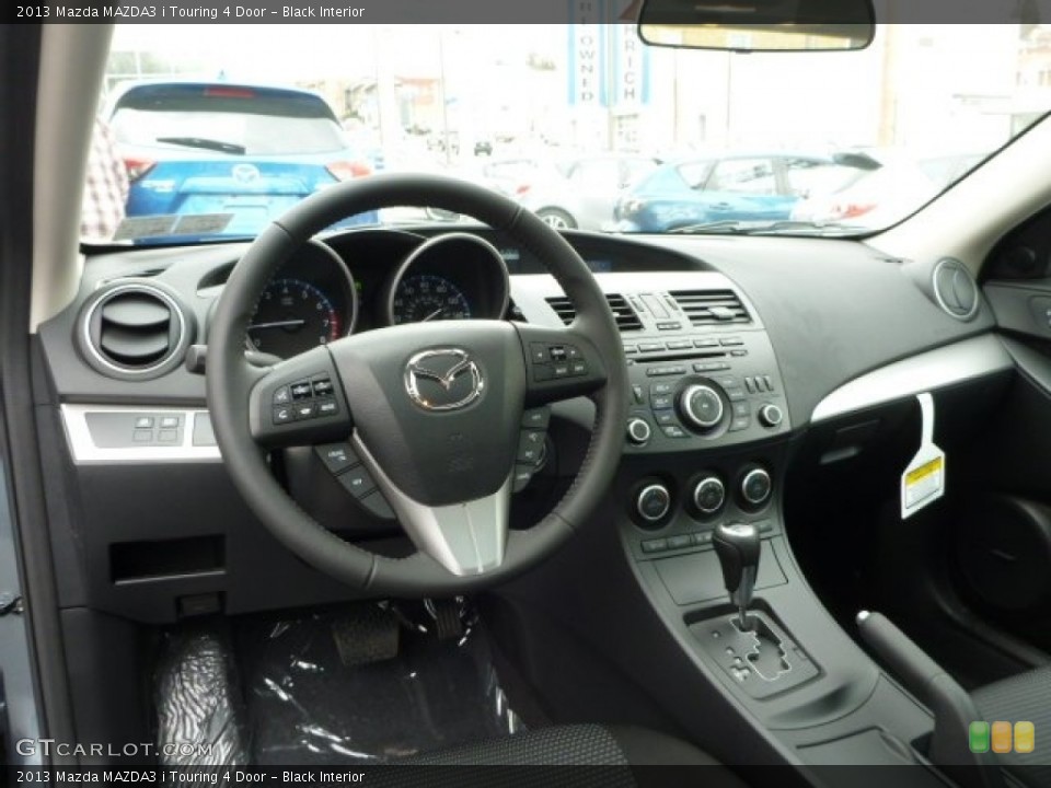 Black Interior Dashboard for the 2013 Mazda MAZDA3 i Touring 4 Door #78913479