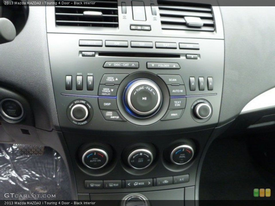 Black Interior Controls for the 2013 Mazda MAZDA3 i Touring 4 Door #78913613