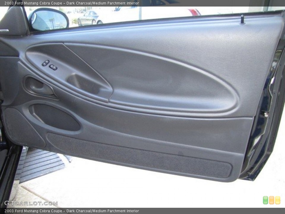 Dark Charcoal/Medium Parchment Interior Door Panel for the 2003 Ford Mustang Cobra Coupe #78926520
