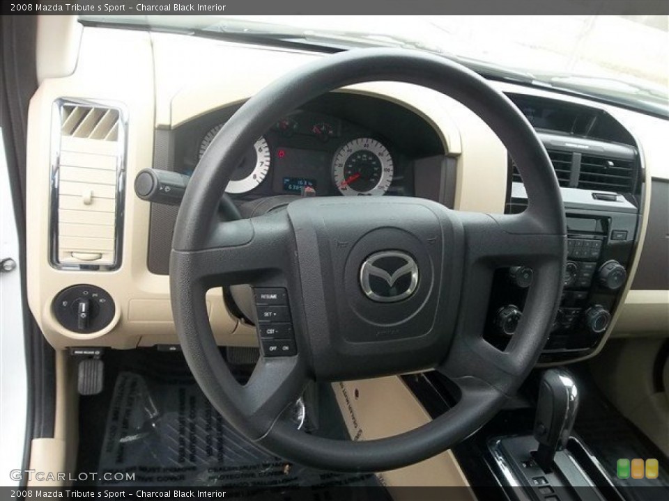 Charcoal Black Interior Steering Wheel for the 2008 Mazda Tribute s Sport #78931041
