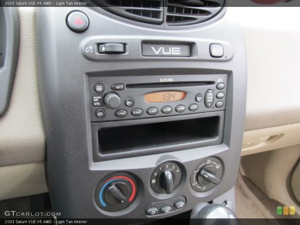 Light Tan Interior Audio System for the 2003 Saturn VUE V6 AWD #78949369
