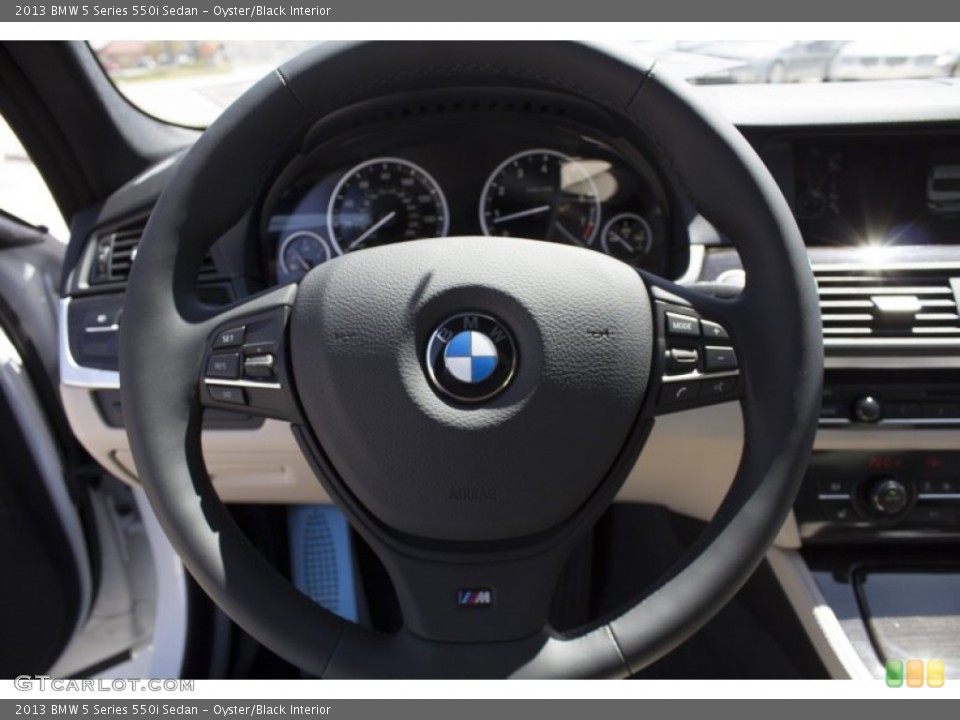Oyster/Black Interior Steering Wheel for the 2013 BMW 5 Series 550i Sedan #78963127