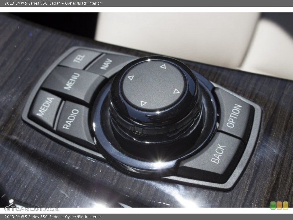Oyster/Black Interior Controls for the 2013 BMW 5 Series 550i Sedan #78963442