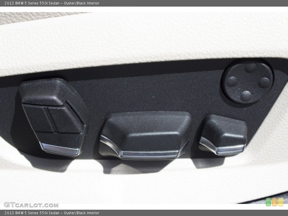 Oyster/Black Interior Controls for the 2013 BMW 5 Series 550i Sedan #78963648