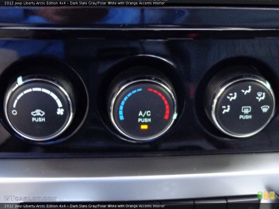 Dark Slate Gray/Polar White with Orange Accents Interior Controls for the 2012 Jeep Liberty Arctic Edition 4x4 #78966829