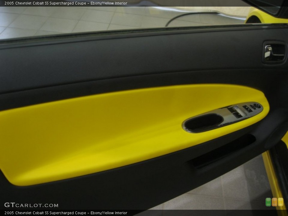 Ebony/Yellow Interior Door Panel for the 2005 Chevrolet Cobalt SS Supercharged Coupe #78973029