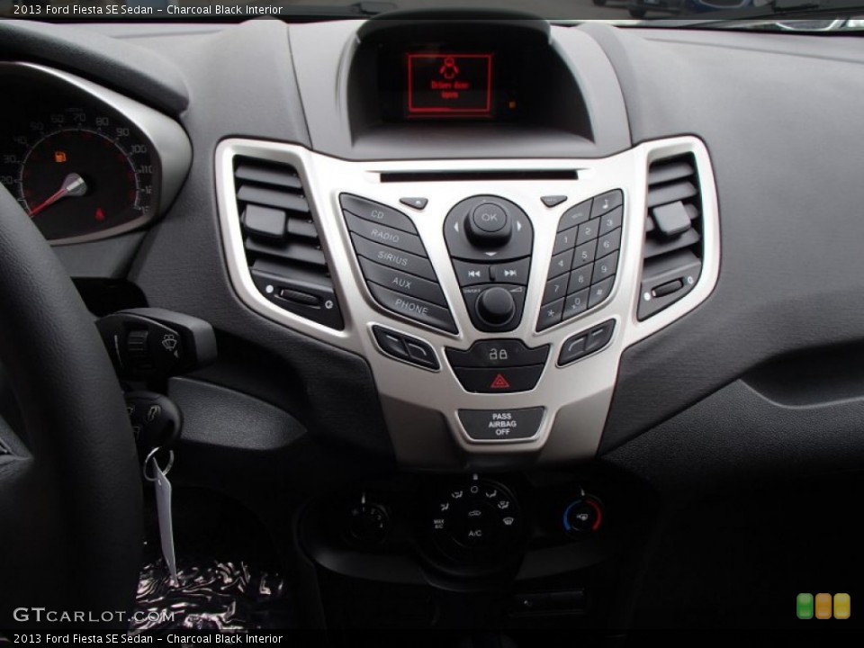 Charcoal Black Interior Controls for the 2013 Ford Fiesta SE Sedan #78991921