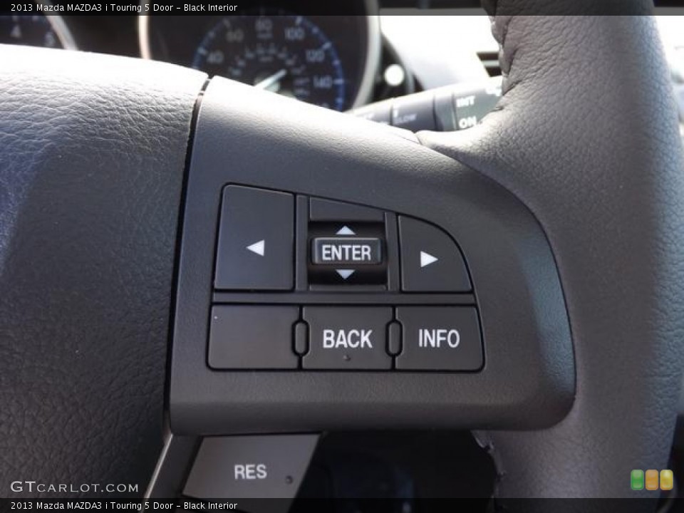 Black Interior Controls for the 2013 Mazda MAZDA3 i Touring 5 Door #78994332