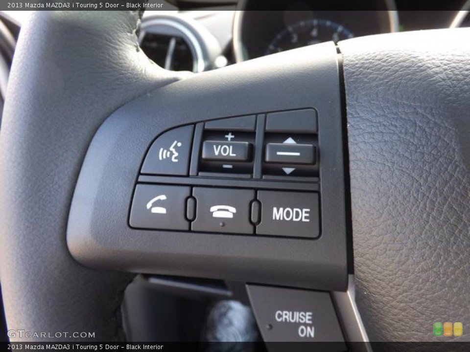 Black Interior Controls for the 2013 Mazda MAZDA3 i Touring 5 Door #78994336