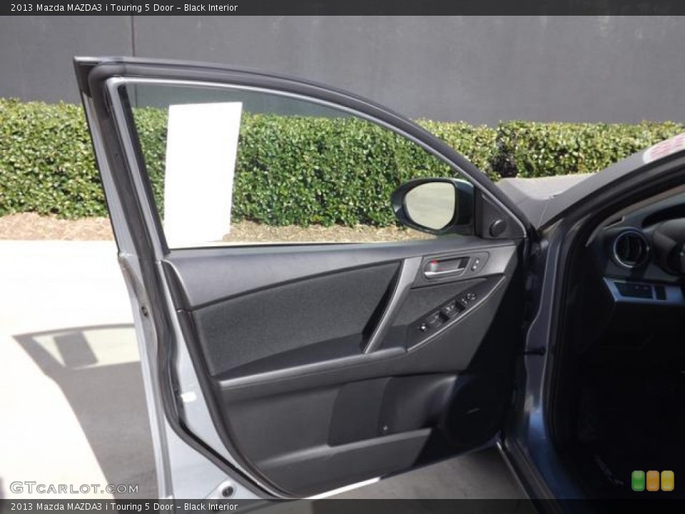 Black Interior Door Panel for the 2013 Mazda MAZDA3 i Touring 5 Door #78994384