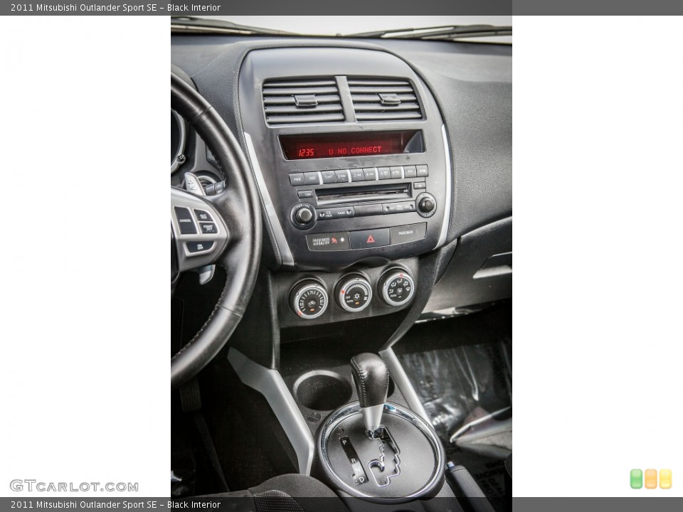 Black Interior Controls for the 2011 Mitsubishi Outlander Sport SE #79021669