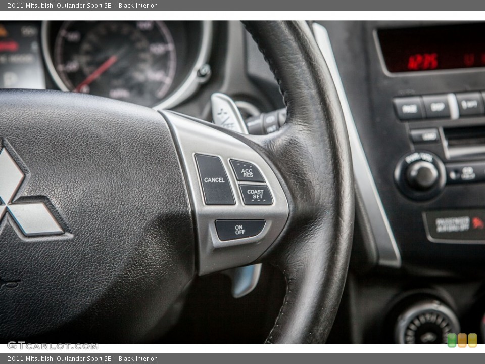 Black Interior Controls for the 2011 Mitsubishi Outlander Sport SE #79021939