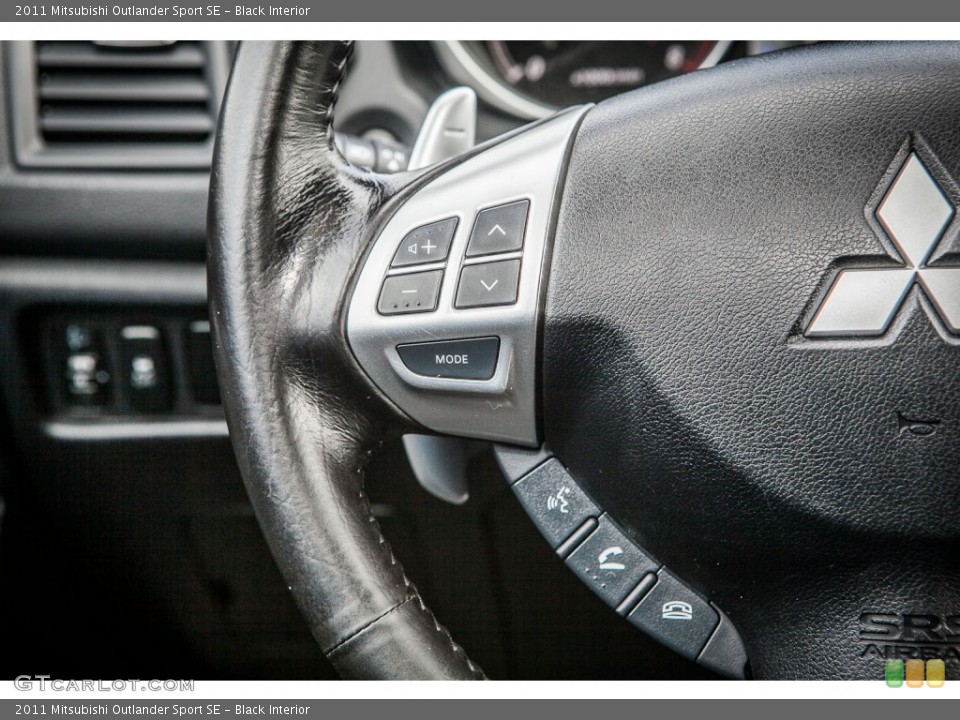 Black Interior Controls for the 2011 Mitsubishi Outlander Sport SE #79021978
