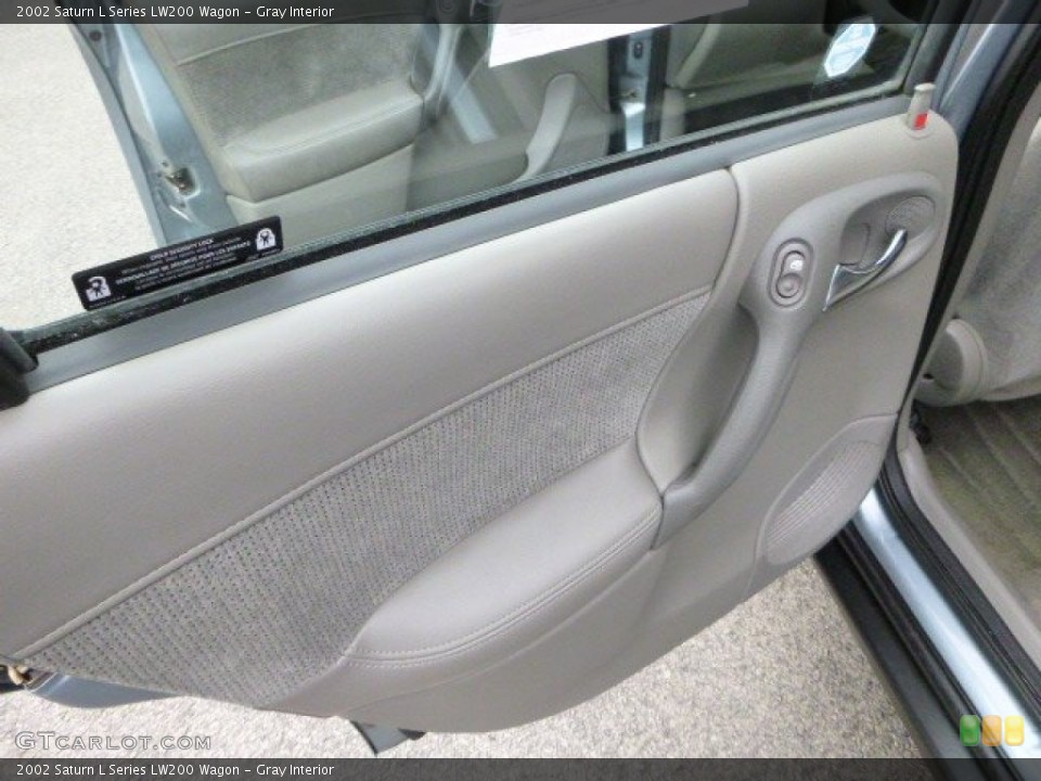 Gray Interior Door Panel for the 2002 Saturn L Series LW200 Wagon #79042011