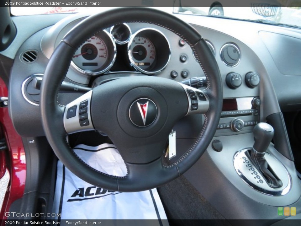 Ebony/Sand Interior Steering Wheel for the 2009 Pontiac Solstice Roadster #79083700