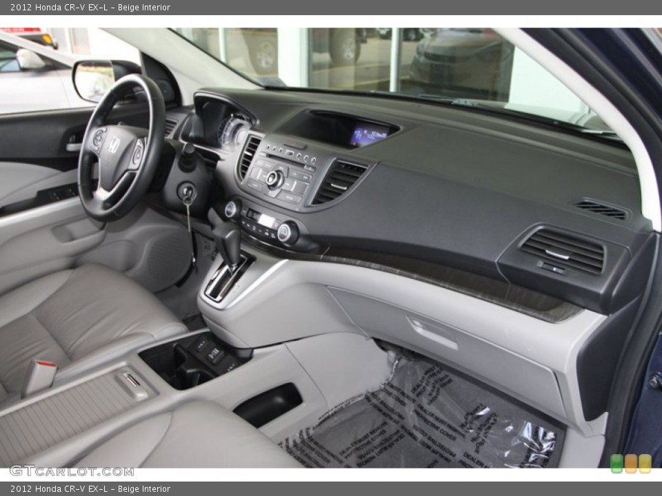 Beige Interior Dashboard for the 2012 Honda CR-V EX-L #79097217